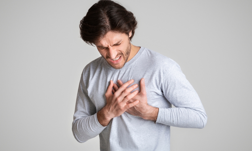 Medical illustration showing heart, lungs, ribs, and other structures that can cause left side chest pain